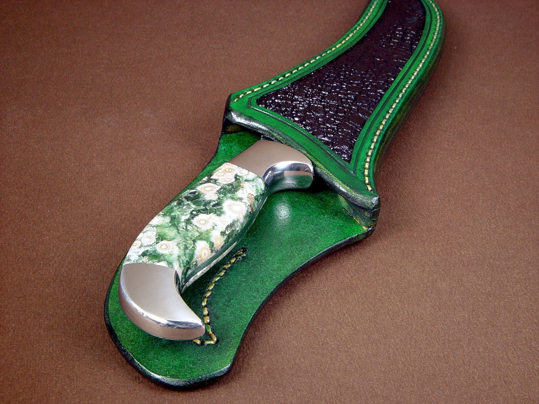 "Dagon" fillet, boning, carving, chef's, collector's knife, obverse side view in 440C high chromium stainless steel blade, 304 stainless steel bolsters, Green Orbicular Jasper gemstone handle, frog skin inlaid in hand-carved leather sheath