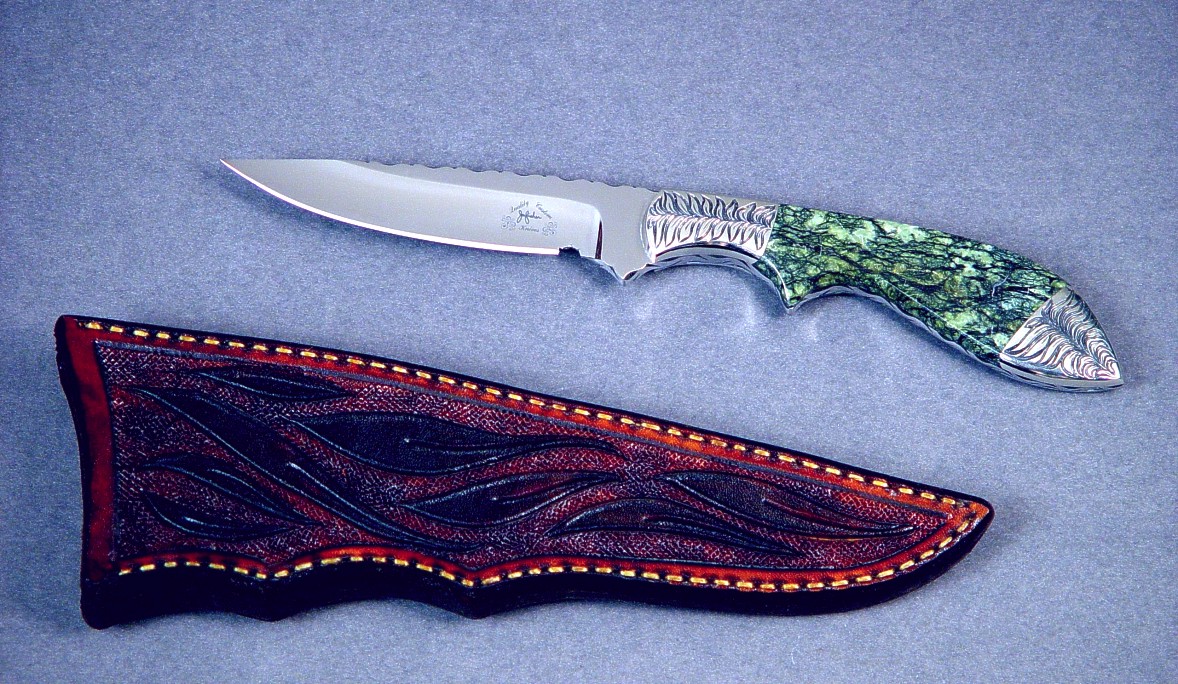 "Durango" in 440C high chromium stainless steel blade, hand-engraved 304 stainless steel bolsters, Bird's eye serpentine gemstone handle, hand-carved leather sheath, with custom display case