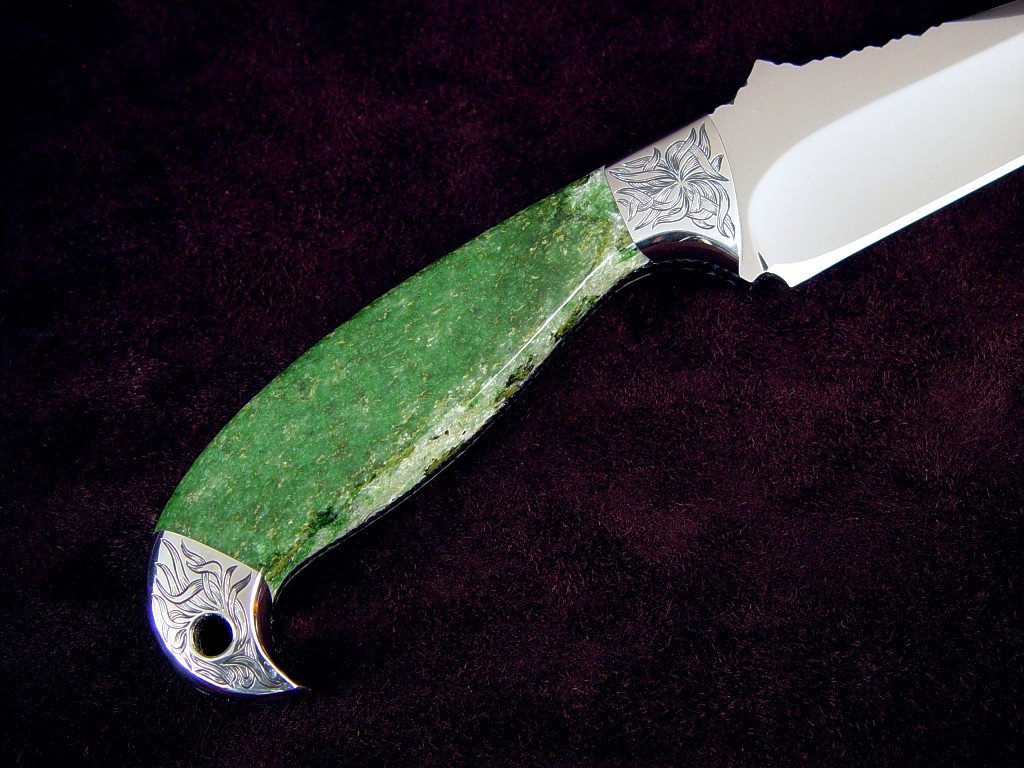 "Mercator" obverse side view: 440C high chromium stainless steel blade, hand-engraved 304 stainless steel bolsters, Nephrite Jade gemstone handle, black stingray skin inlaid in leather sheath