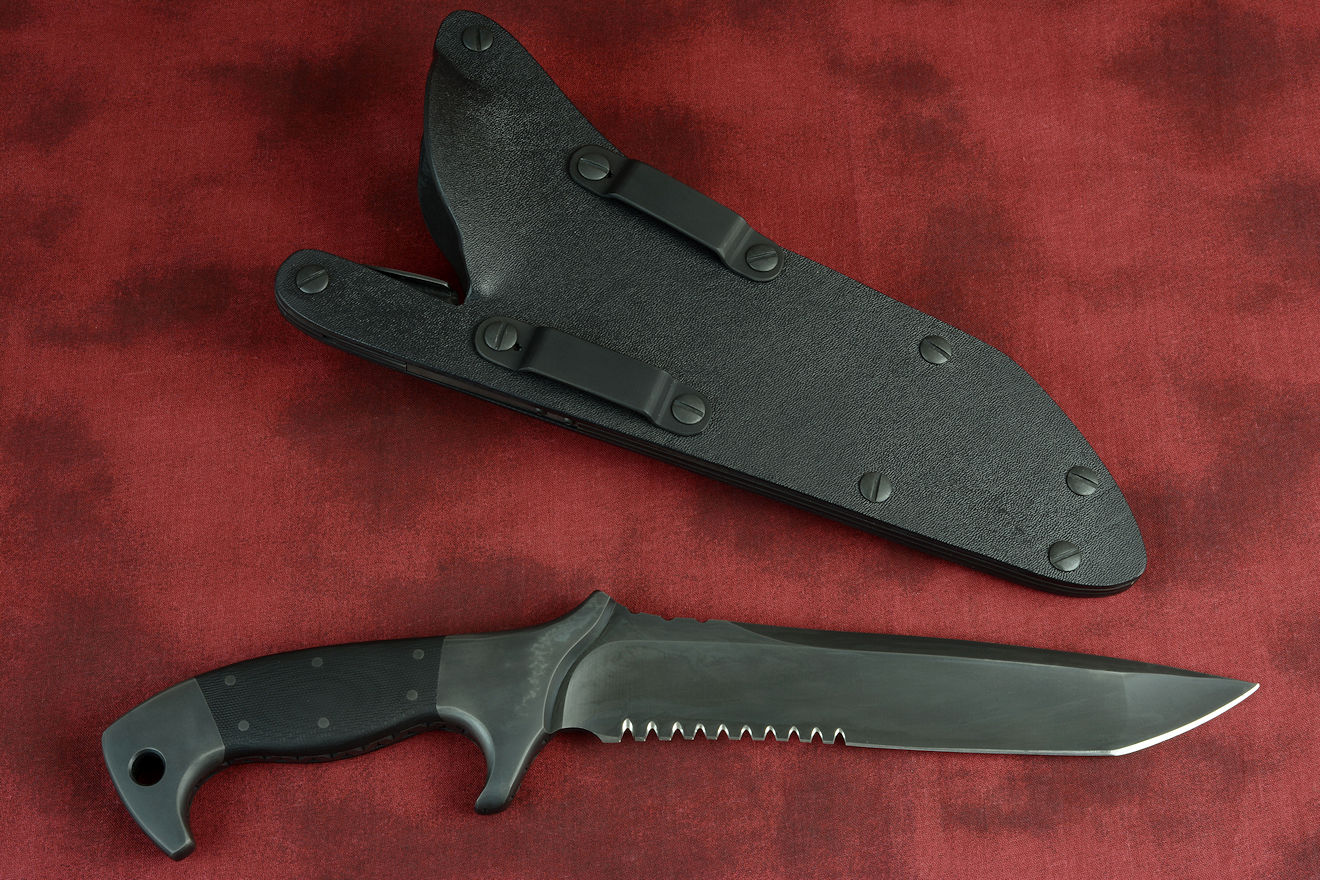 "Taranis" Tactical Counterterrorism Knife in Shadow black treatment of CPMS30V high vanadium stainless steel blade, 304 stainless steel bolsters, G10 fiberglass/epoxy composite handle, Locking (version 2.0) sheath in kydex, anodized aluminum, stainless steel, titanium