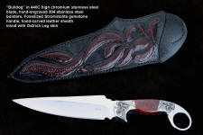 "Bulldog" obverse side view in 440C high chromium stainless steel blade, hand-engraved 304 stainless steel bolsters, Fossilized Stromatolite Algae gemstone handle, hand-carved leather sheath inlaid with burgundy ostrich leg skin