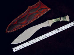 "Maginus-Nasmyth" custom handmade khukri, scaled view. The cutting edge of the khukri is long and formidible