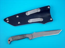 "PJLT" CSAR Instructors Knife, reverse side view. Note reversible die formed high strength corrosion resistant aluminum belt loops secured by nickel plated steel screws