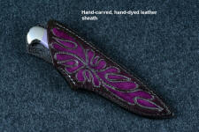 "Andromeda" sheathed view in T3 deep cryogenically treated CPM 154CM powder metal technology high molybdenum stainless steel blade, 304 stainless steel bolsters, Purple Turkish Jade gemstone handle, hand-carved, hand-dyed leather sheath