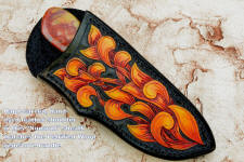 "Nunavut" obverse side view in 440C high chromium stainless steel blade, hand-engraved 304 stainless steel bolsters, agatized, jasper petrified wood gemstone handle, hand-carved, hand-dyed leather sheath